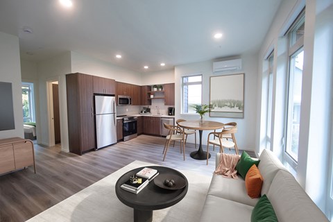 a living room with a couch and a table