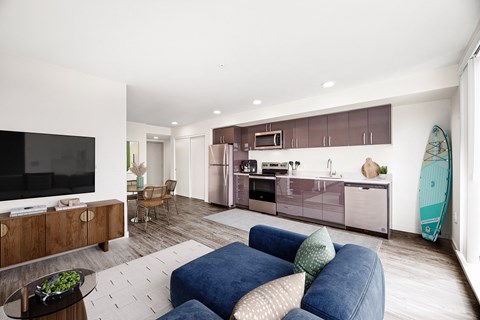 a living room with a couch and a tv