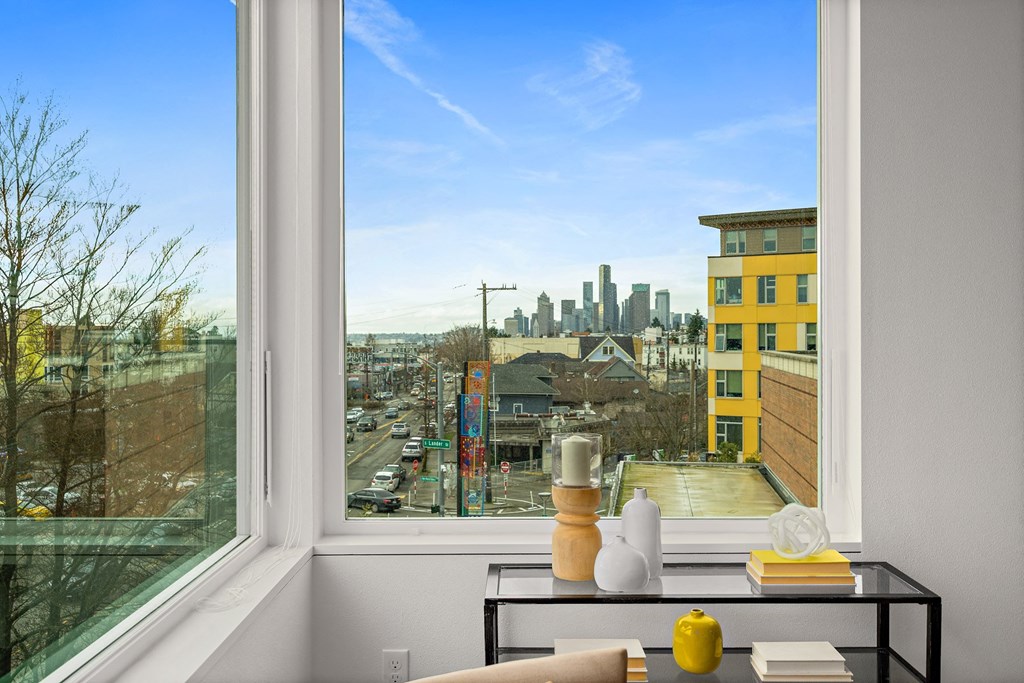 a view of the city from a living room window