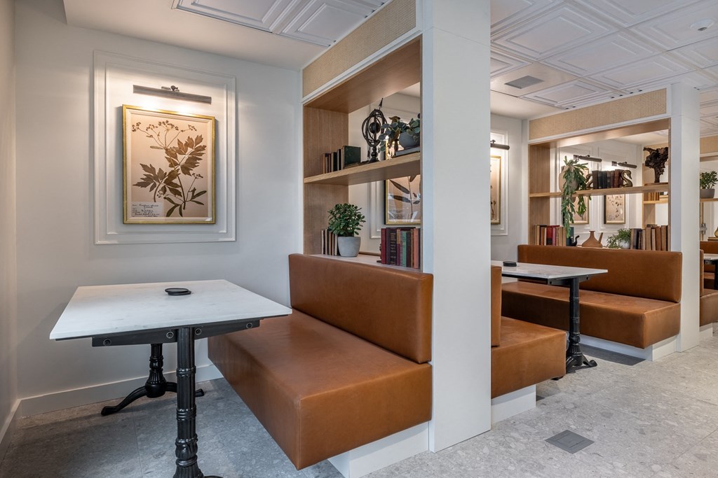 a seating area with couches and a table