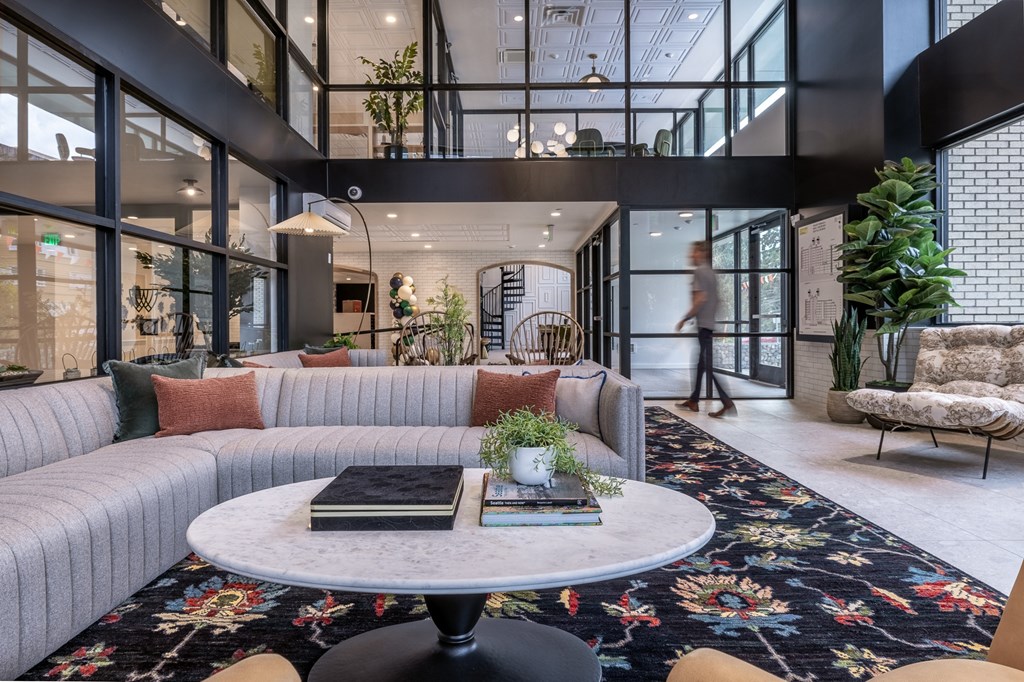 a living room with a couch and a coffee table