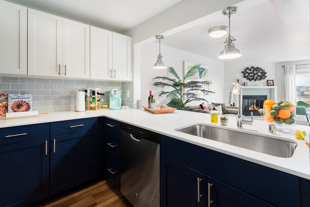 This kitchen has stainless steel appliances.