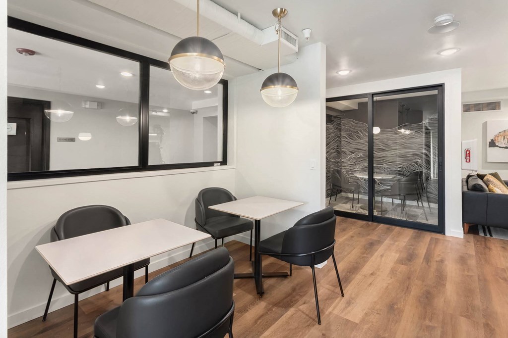 a dining room with tables and chairs