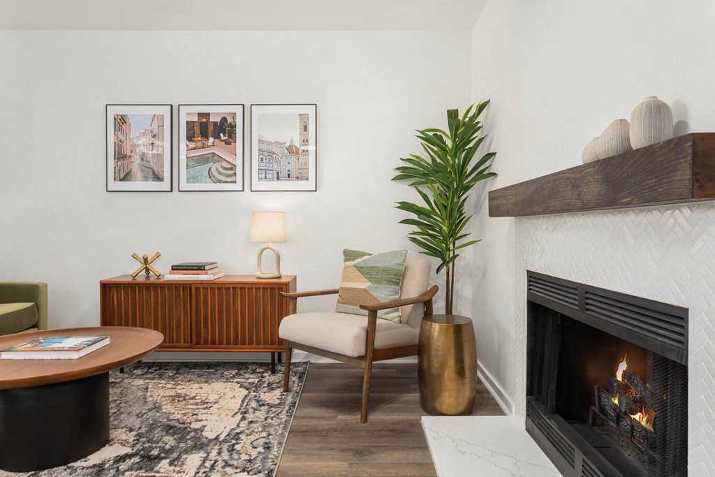 a living room filled with furniture and a fire place