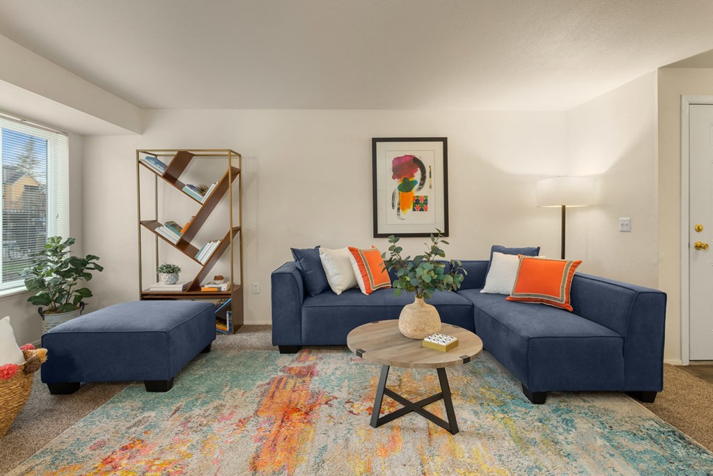 a living room with two couches and a coffee table