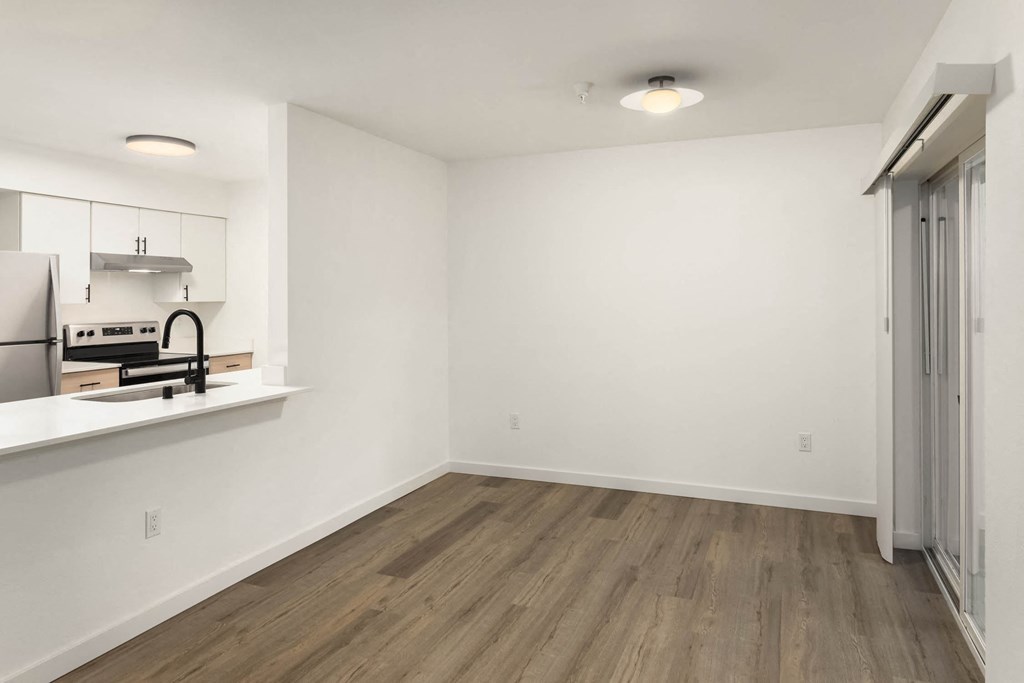 a desk with a rolling work chair.