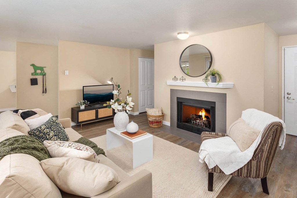 a living room with a fireplace and a couch