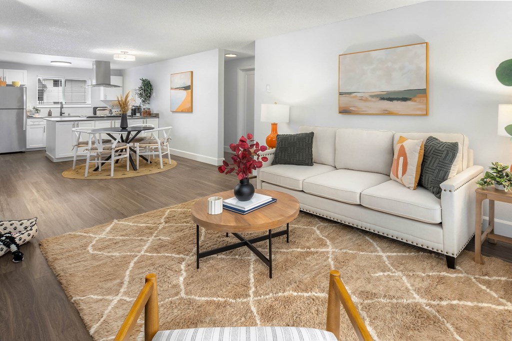 a living room with a couch and a table