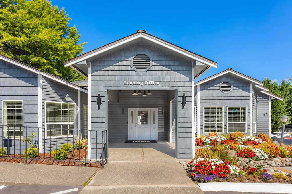 A building with a sign that says "Leasing Office" is shown.