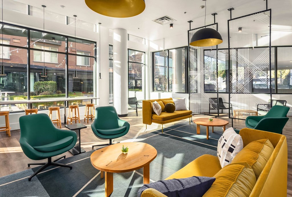 a room filled with furniture and a large window