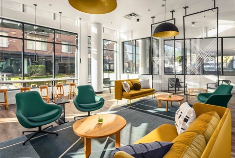 a room filled with furniture and a large window