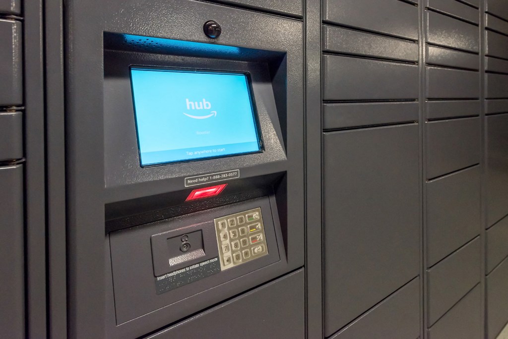 an airport teller machine with a blue screen on it