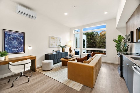 a living room with a couch and a table