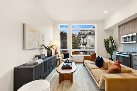 a living room with a couch and a table