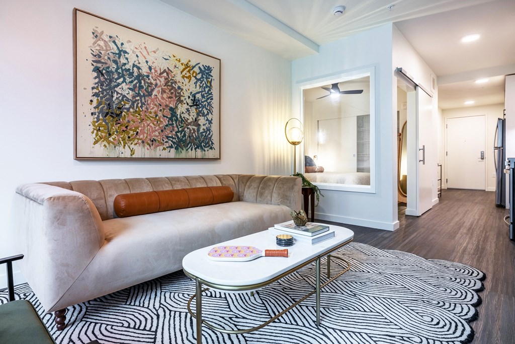 a living room with a couch and a coffee table