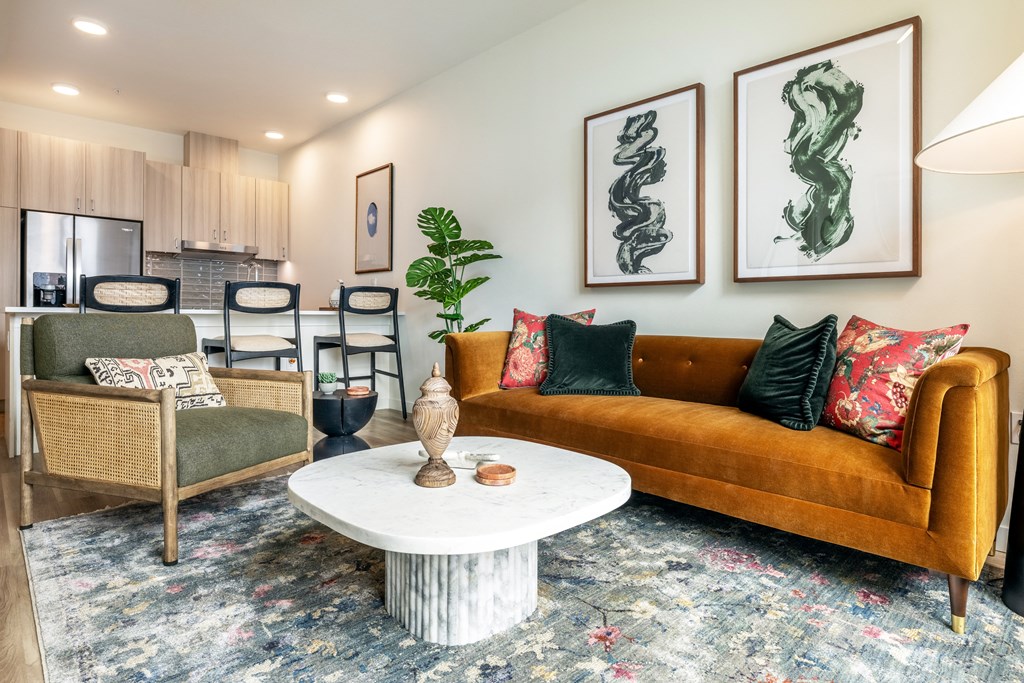 a living room with a couch and a table