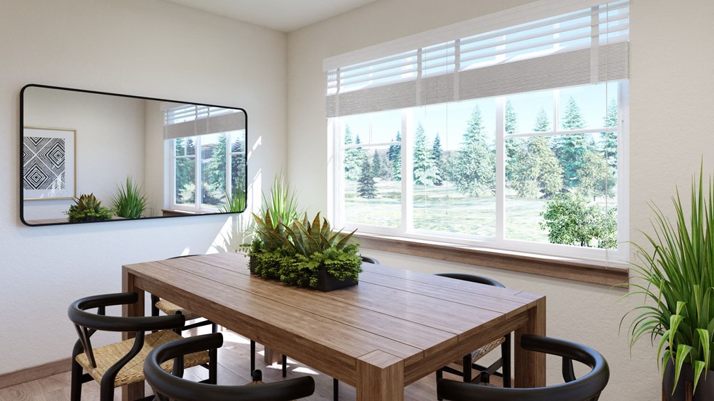 a dining room with a large window and a table with chairs