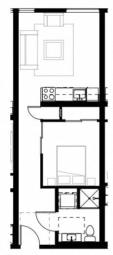 a small room with a desk and a chair