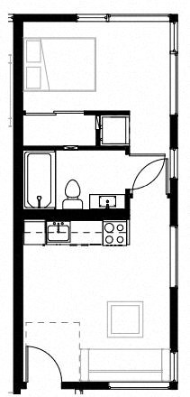 a small room with a sink and a mirror