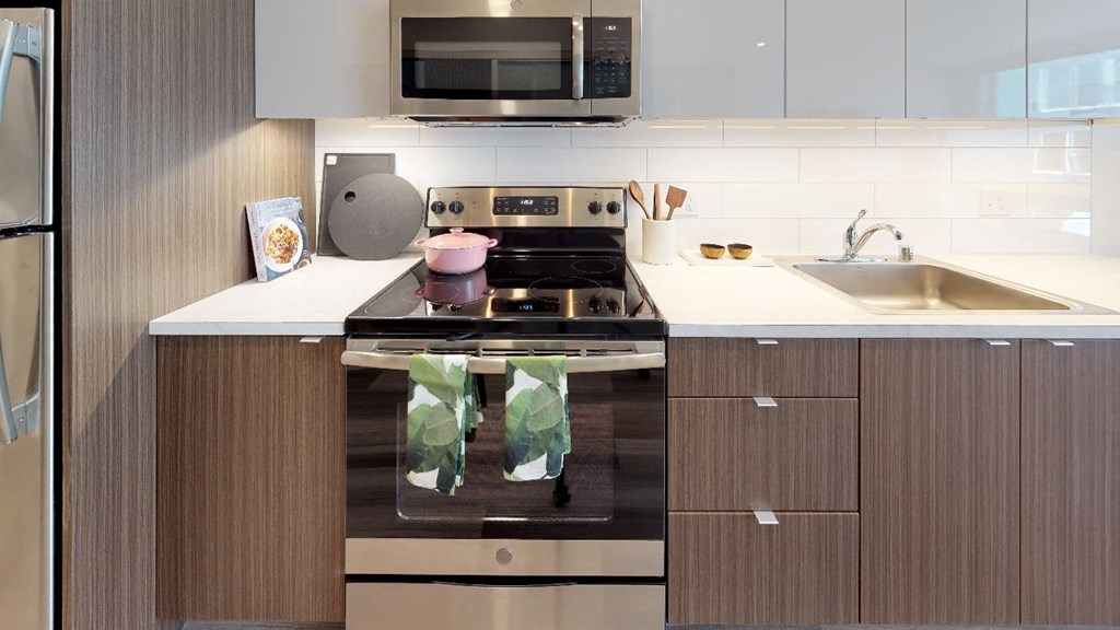 a kitchen with a stove and a sink
