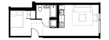 a room with a sink and a refrigerator in it