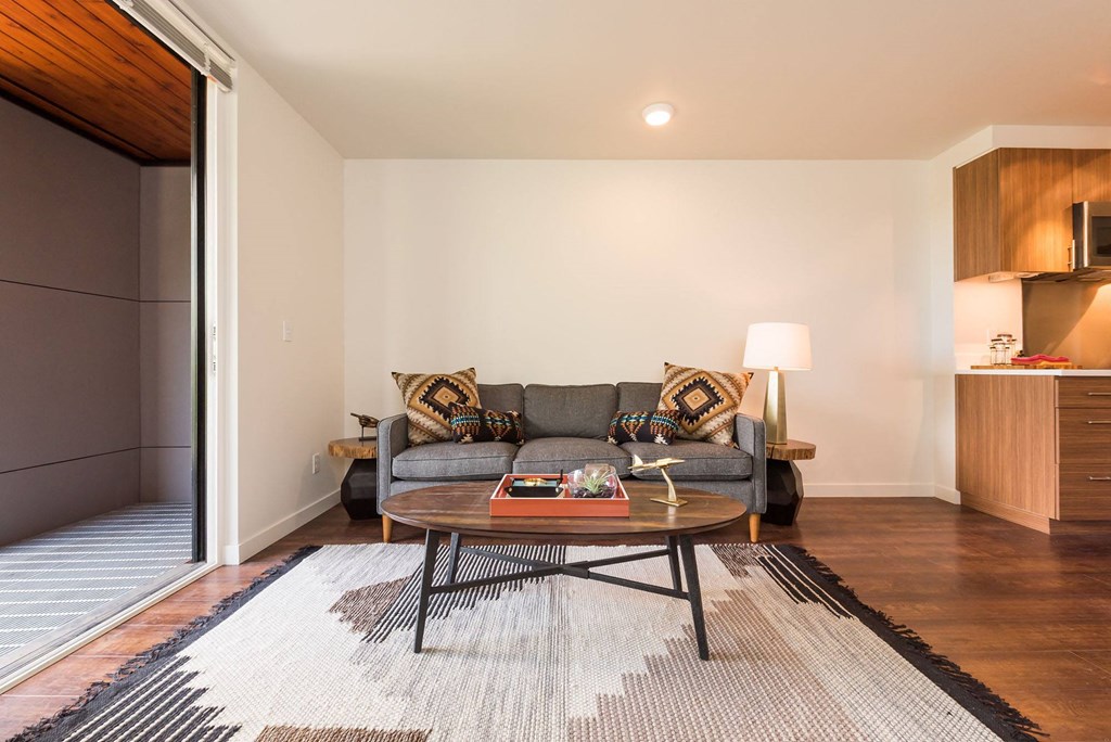 a living room with a couch and a coffee table