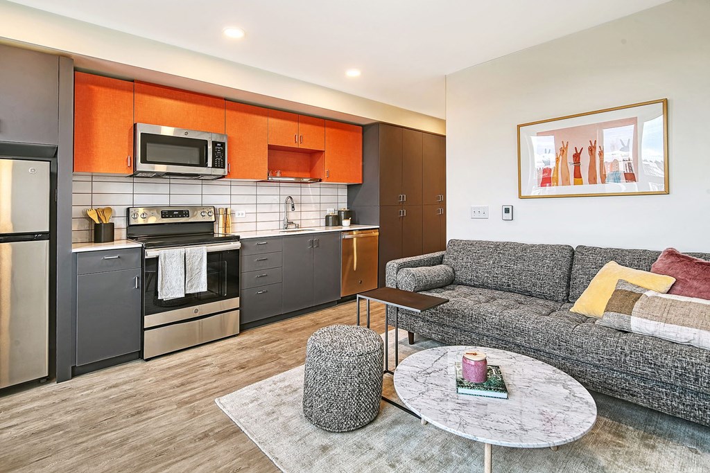 a living room with a couch and a table