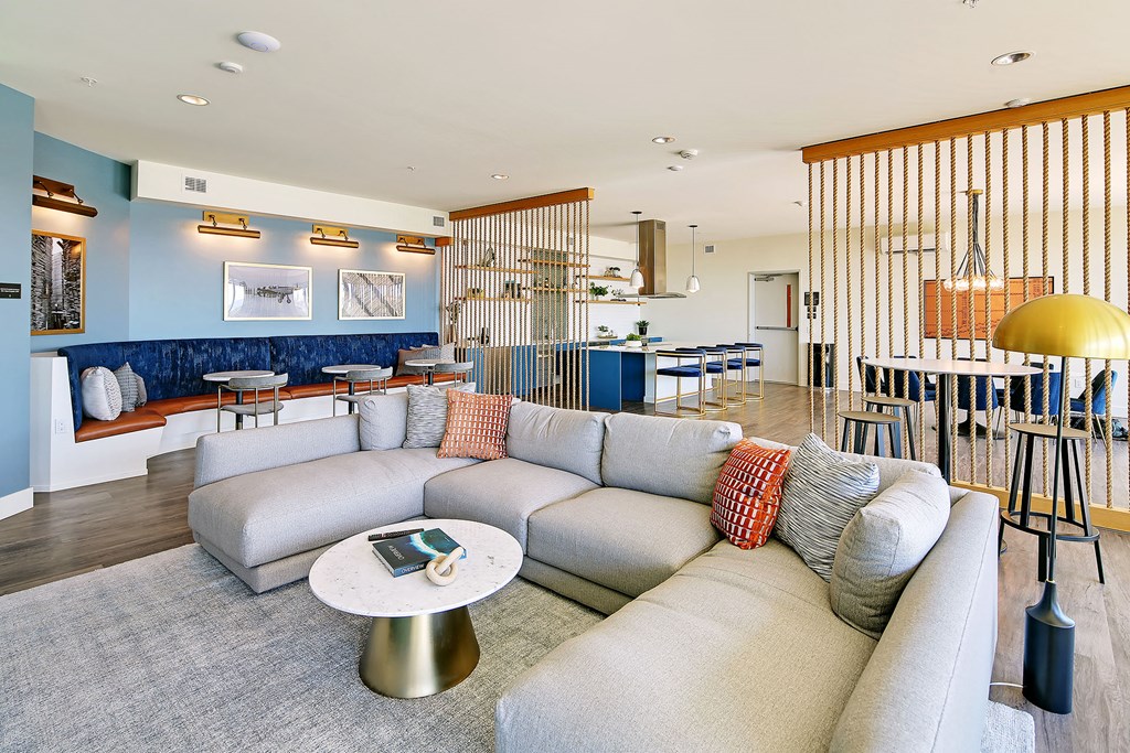 a living room with a couch and a table