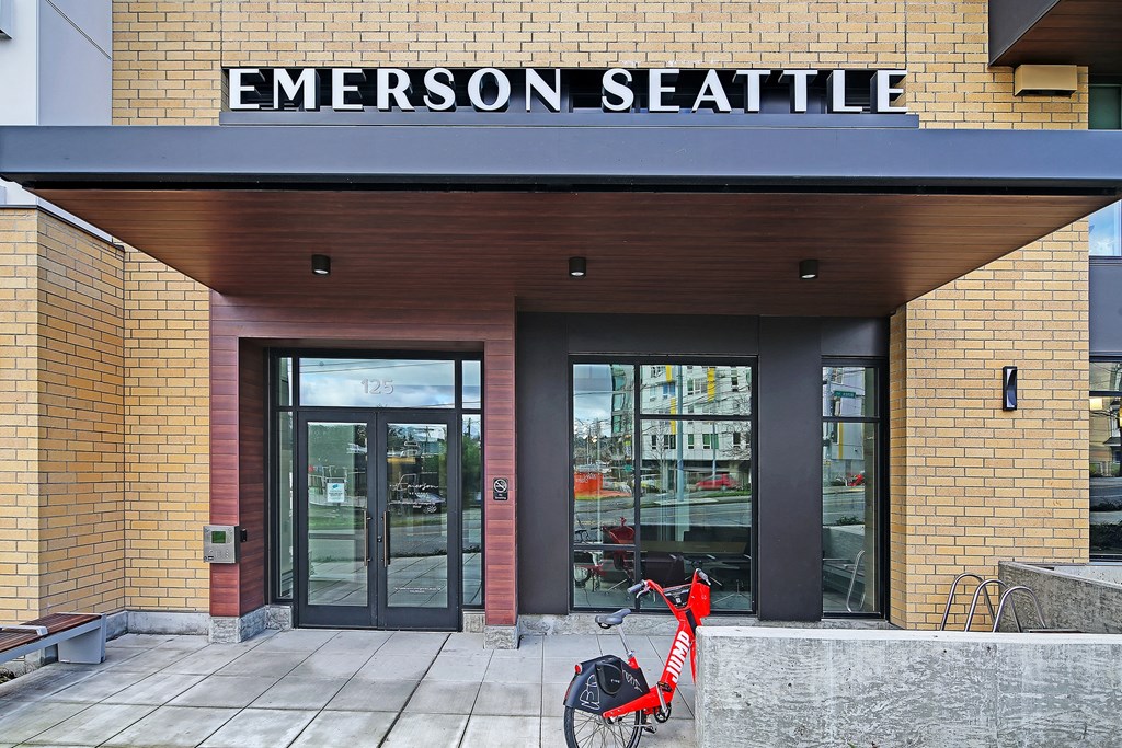 a bike parked in front of the entrance building