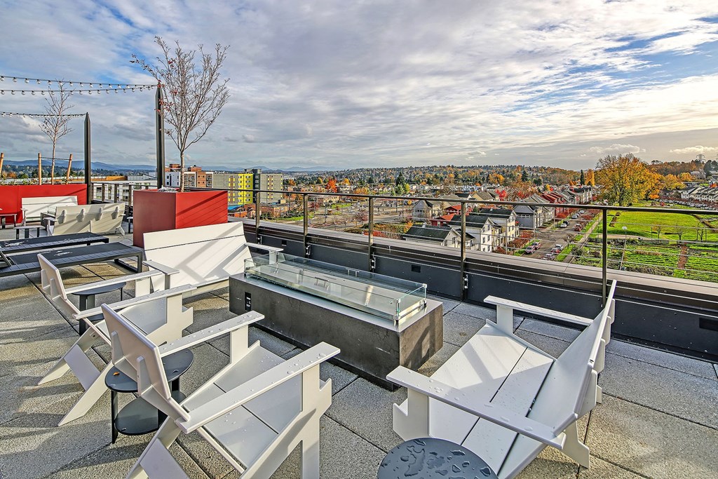 views of the city from the rooftop terrace of an apartment building