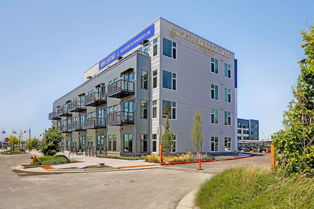 a tall building with a street in front of it