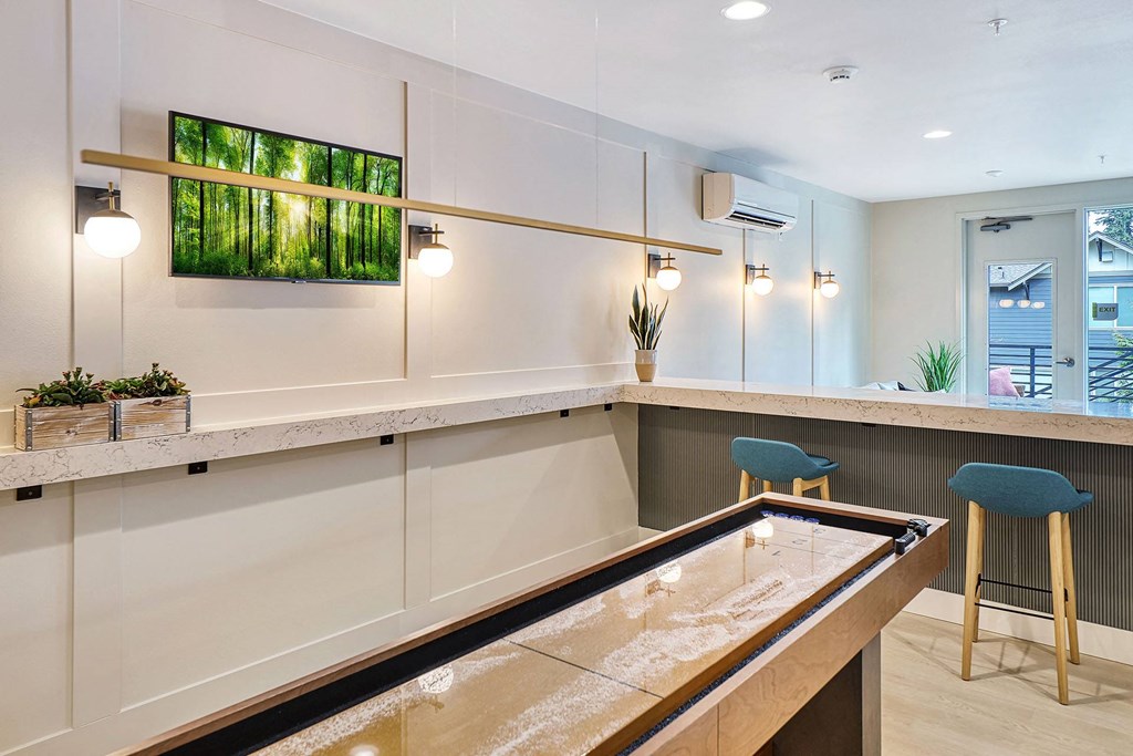 a kitchen with a tub in the middle of the counter