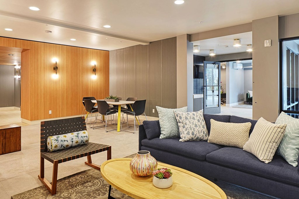 a living room and dining area in a 555 waverly unit