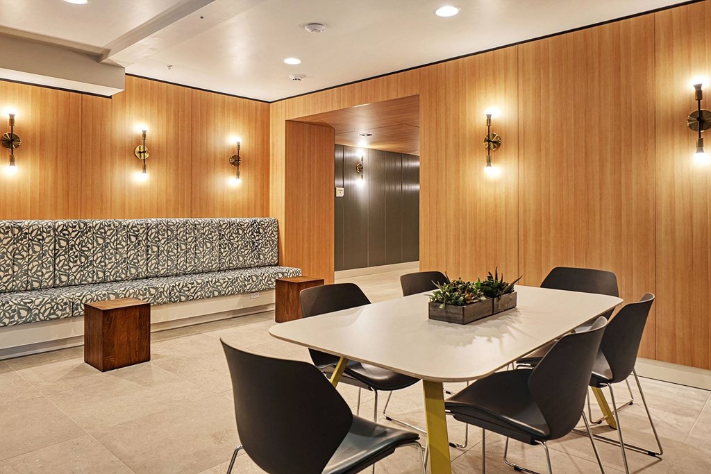 a room filled with furniture and a large window