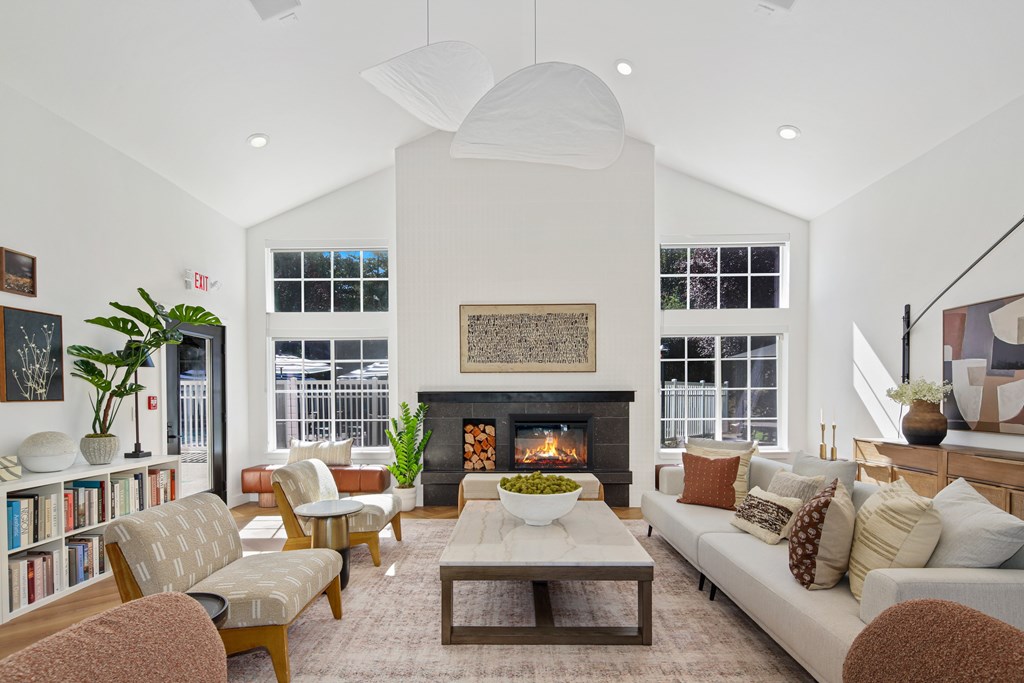 A living room with a fireplace and a couch.