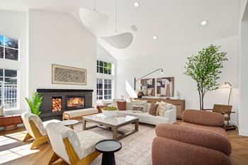 A living room with a fireplace and a couch.