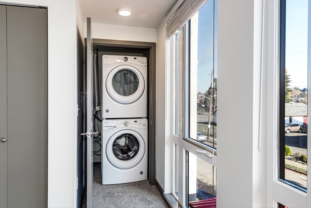 a washer and dryer in a closet in a home
