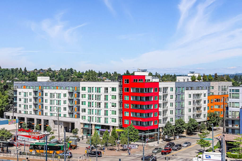 a view of apartment buildings in a city