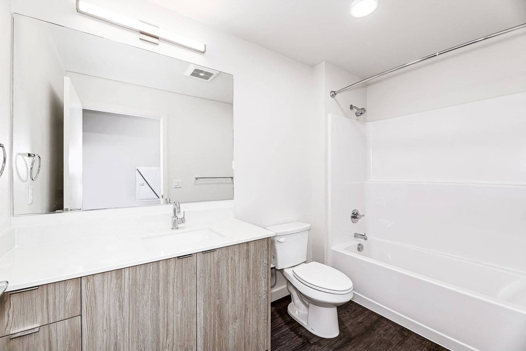 a bathroom with a toilet and a sink