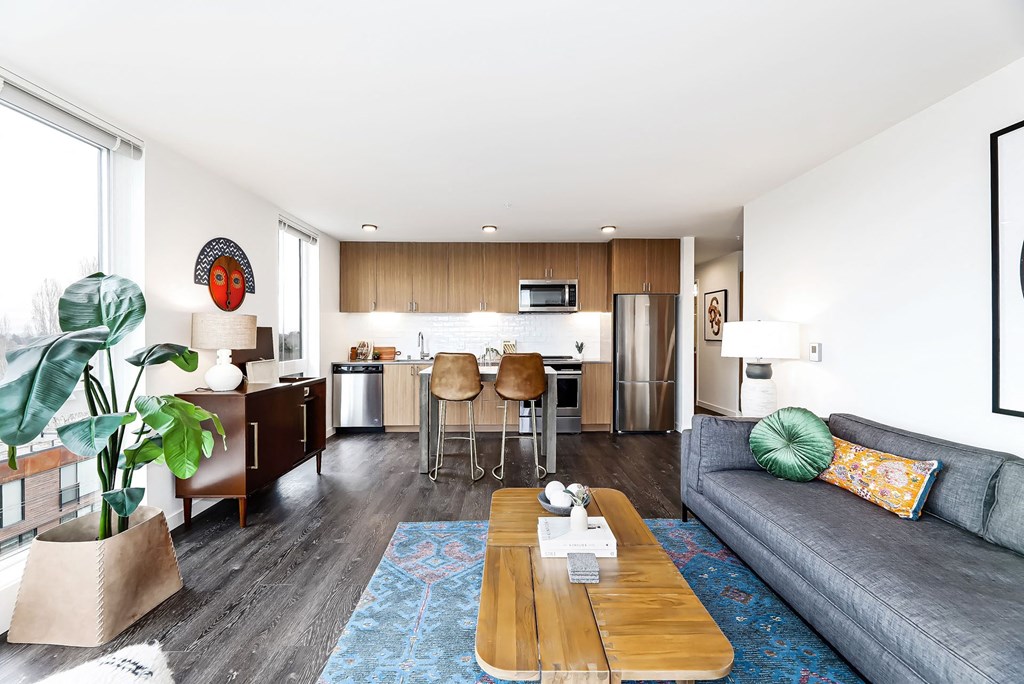 a living room with a couch and a table