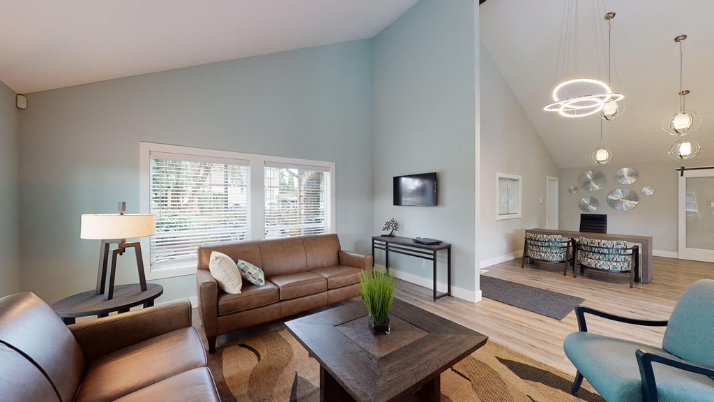 a living room with a couch and a table