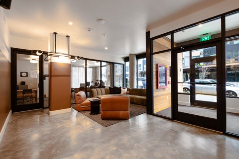 A modern waiting area with a brown and beige color scheme.