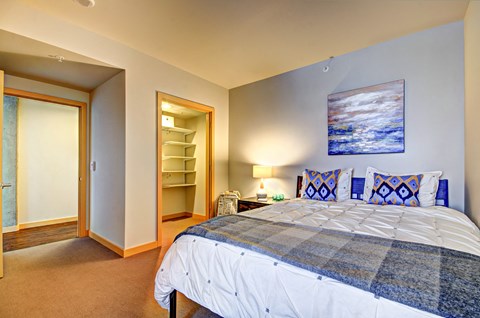the master bedroom has a king sized bed and ensuite bathroom