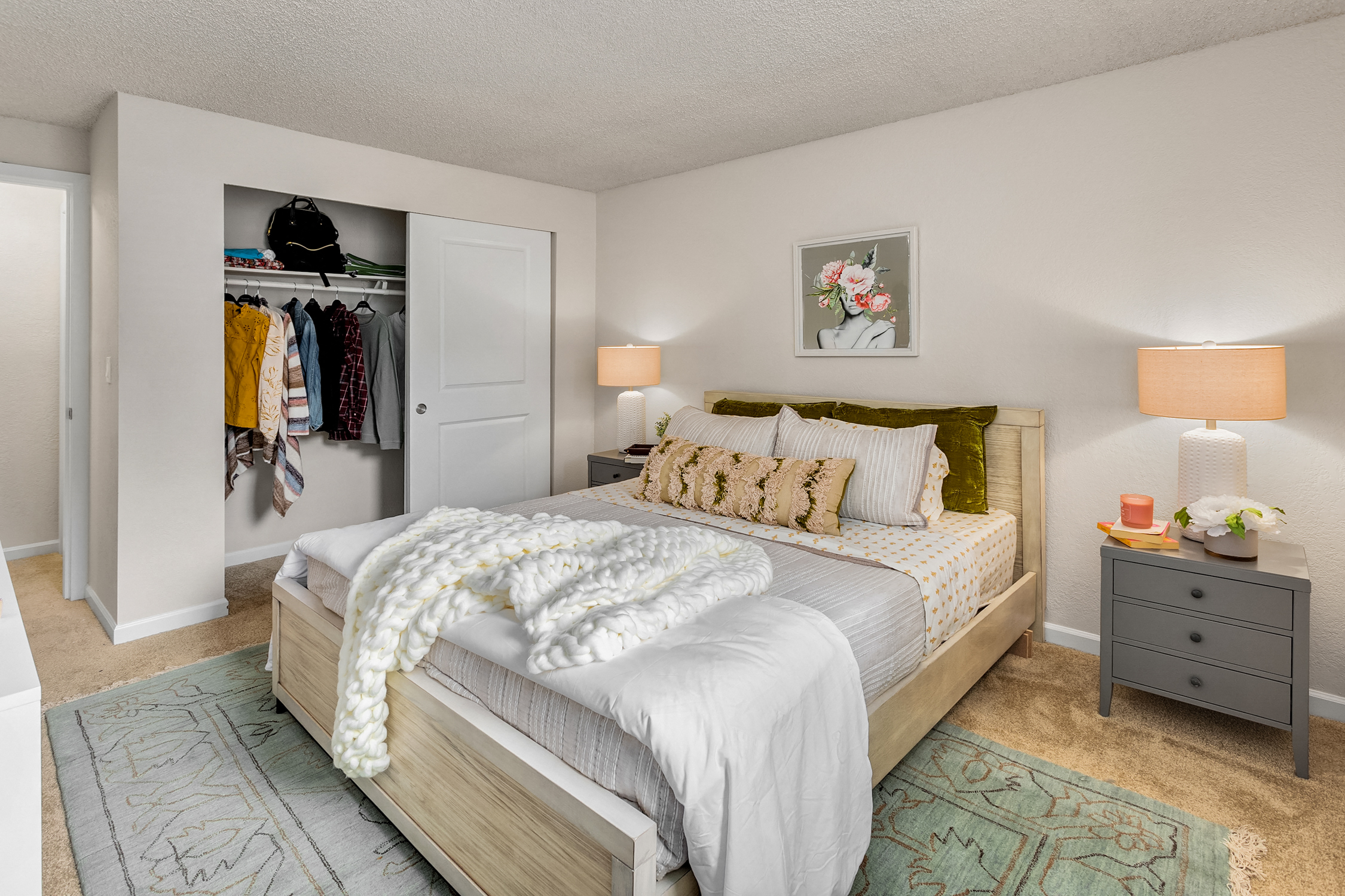 a bedroom with a bed and a closet