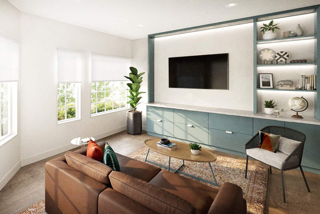 a living room with a couch and a tv