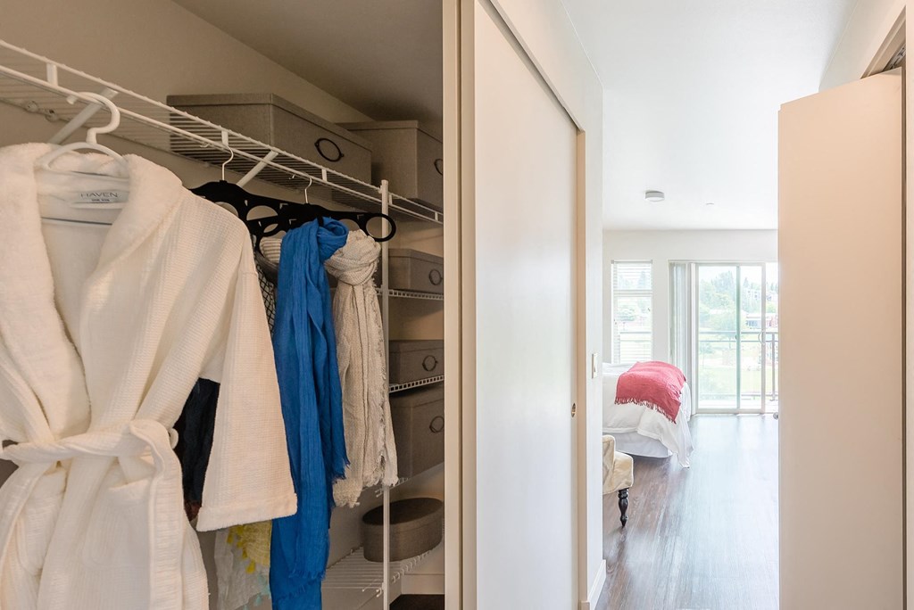 a walk in closet in a 555 waverly unit