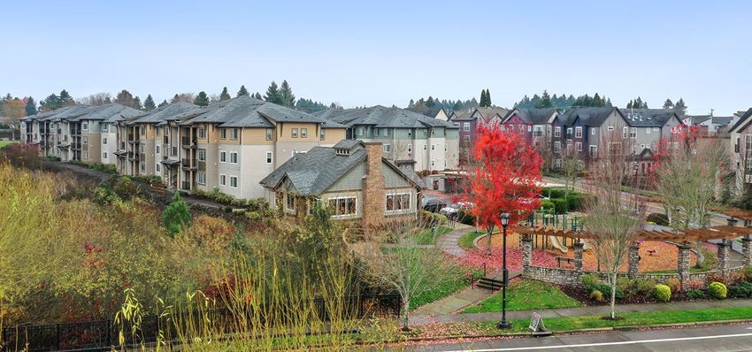 an aerial view of a neighborhood with houses and trees