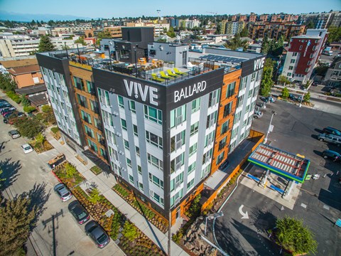 A Vive Ballard hotel is shown from an aerial perspective.