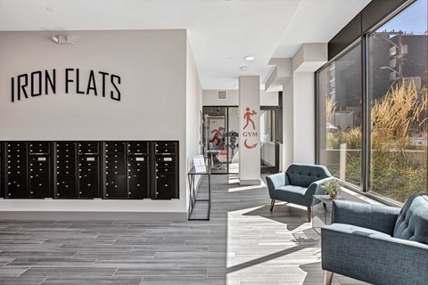 Iron Flats Gym is located in a modern building with a spacious lobby.