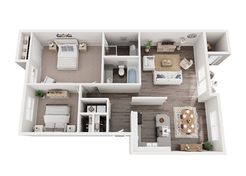 A top-down view of a small apartment with a kitchen, living room, and bedroom.